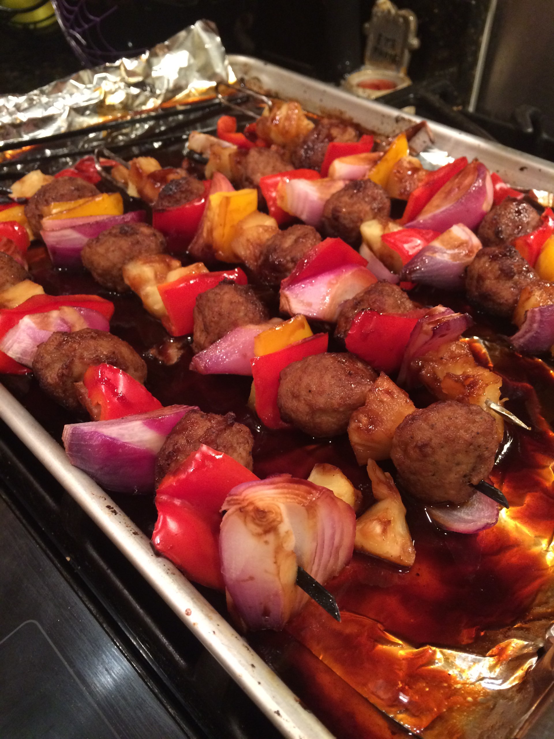 Chicken sausage shish kabobs with onions peppers pineapple and teriyaki
