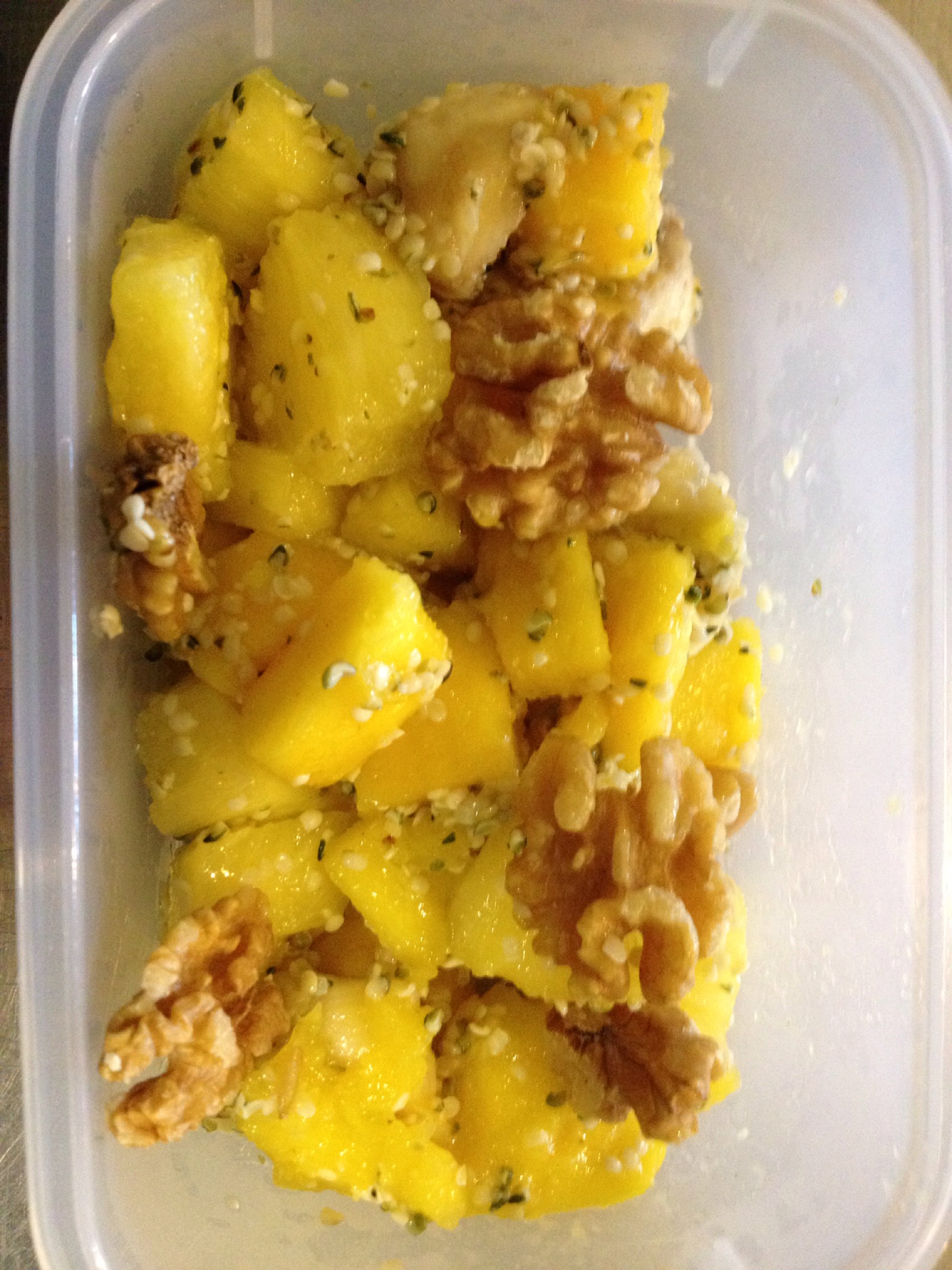 Breakfast papaya, Banana, pineapple, walnuts and hempseed. Fooducate Diet Motivation