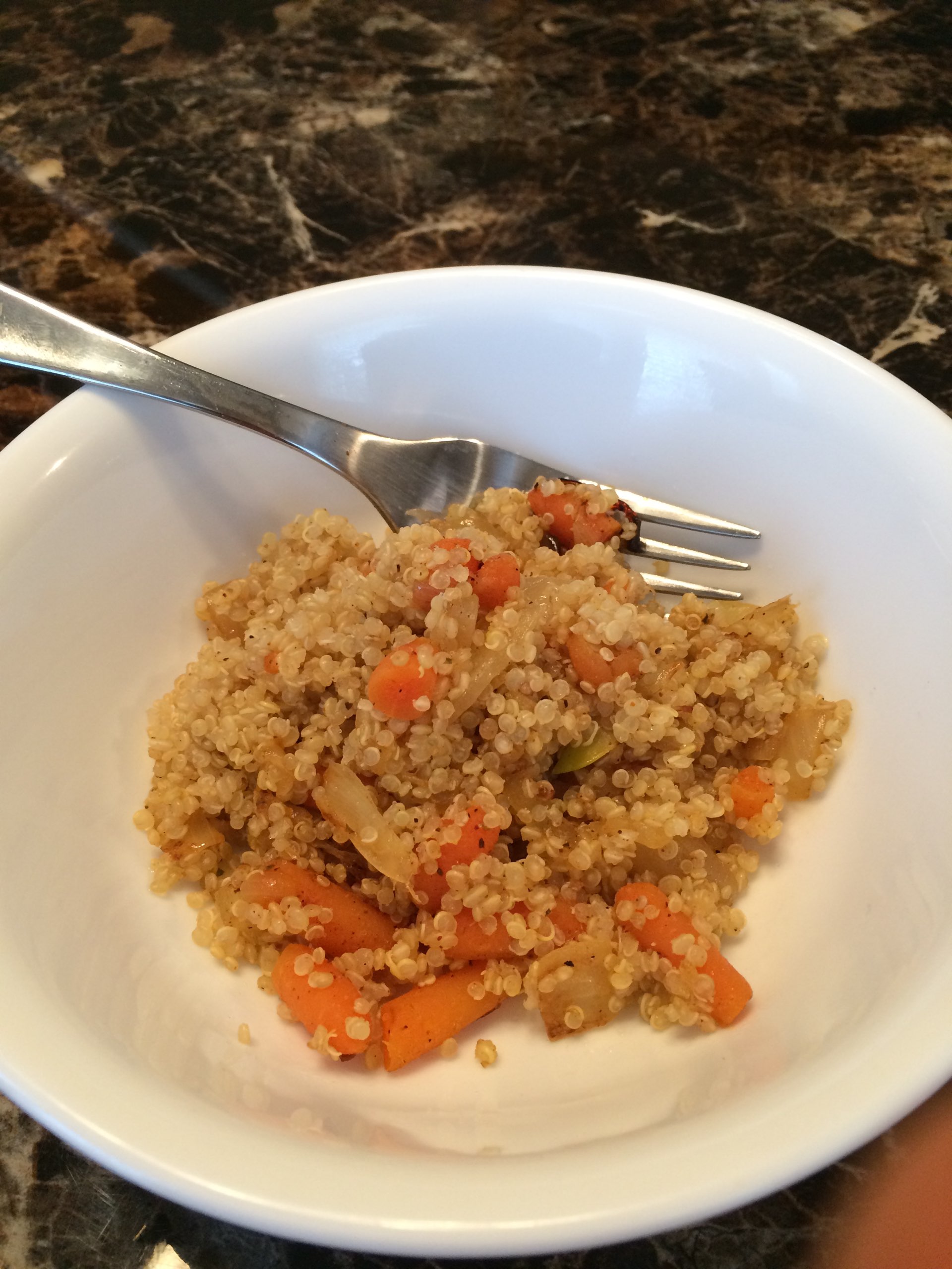 Quinoa pilaf with onions and carrots. Had to make do with a pretty