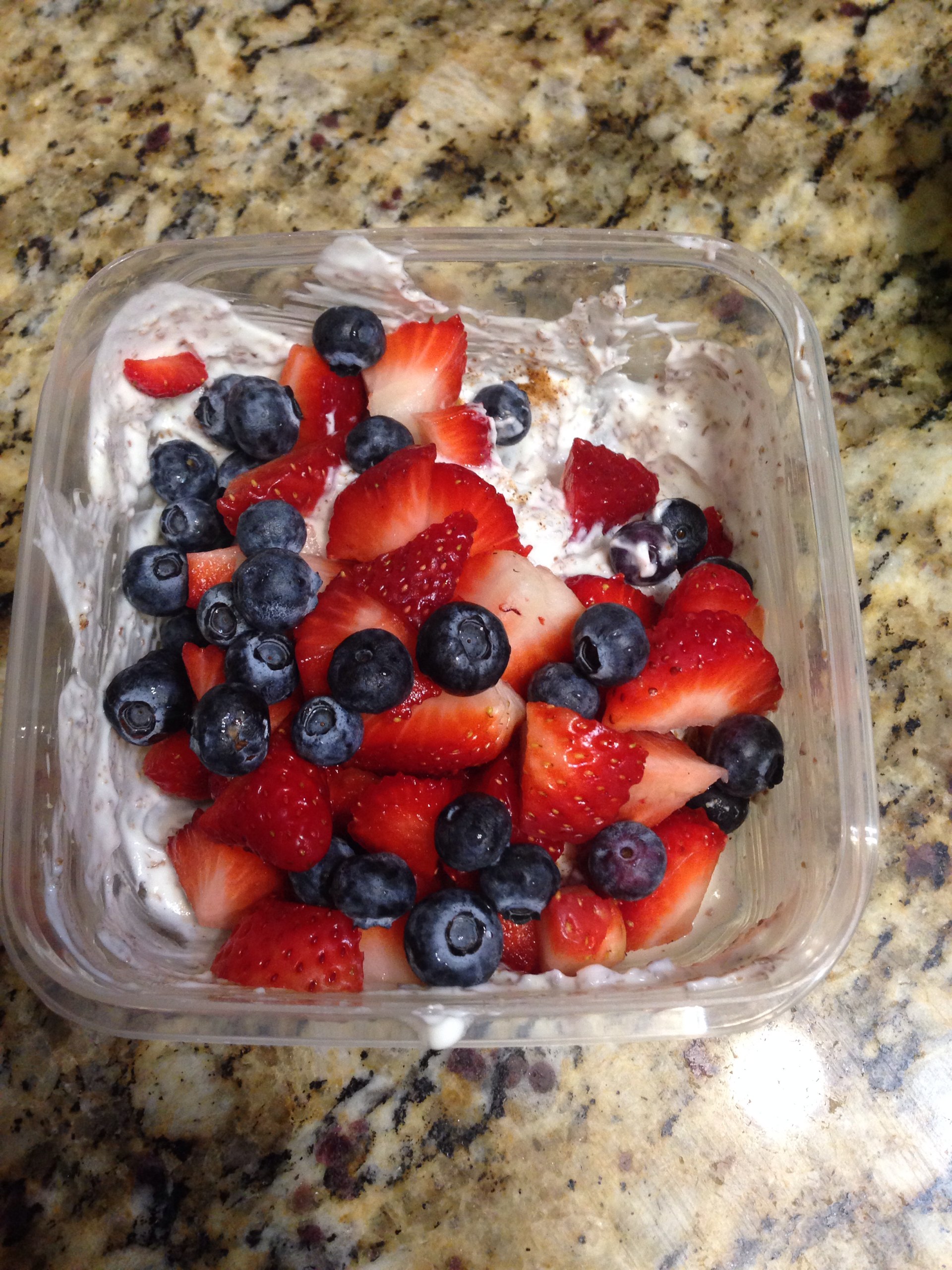 Breakfast.... Greek yogurt with flaxseed, strawberries, and blueberries