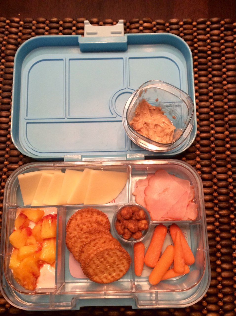 Wednesday's school lunch! Provolone cheese, ham, wheat crackers, Greek