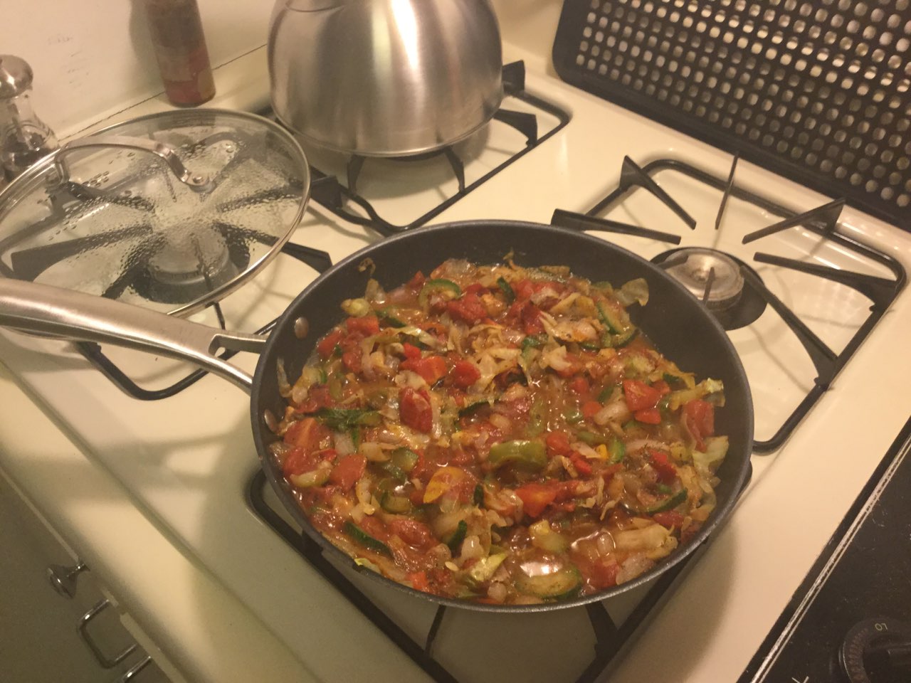 Dinner tonight....Zoodles, peppers, onions and fire roasted tomatoes