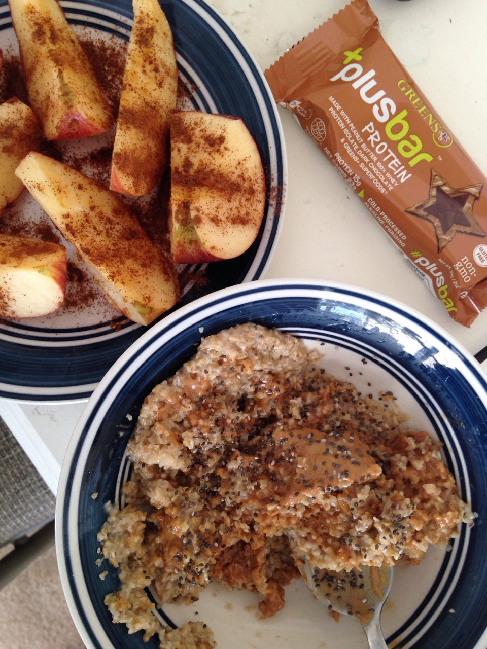 Steel cut oats with chia seeds and peanut butter, cinnamon apples, and
