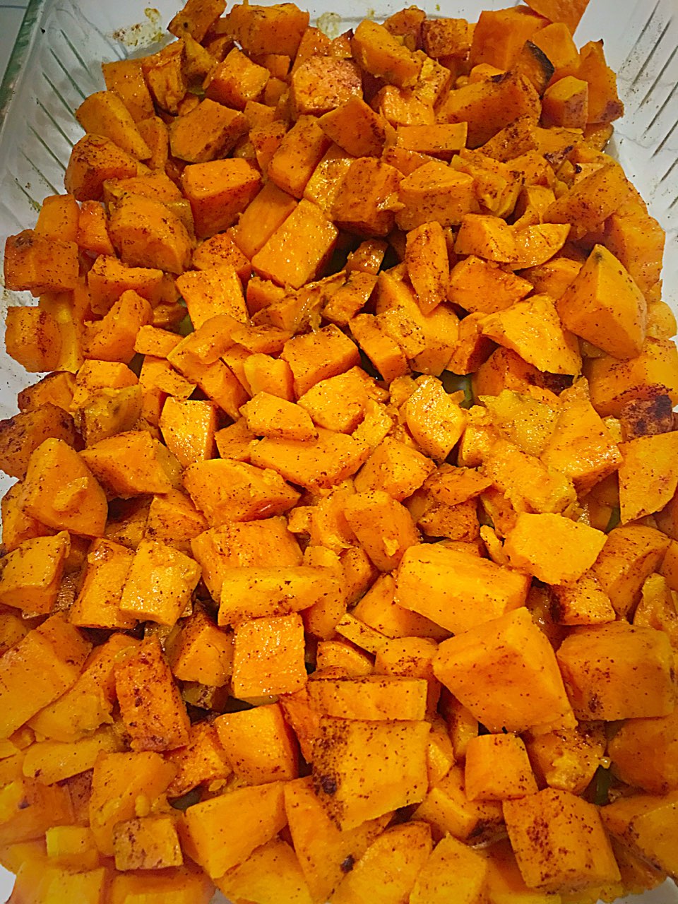 Sweet potatoes brushed with melted coconut oil and sprinkled with