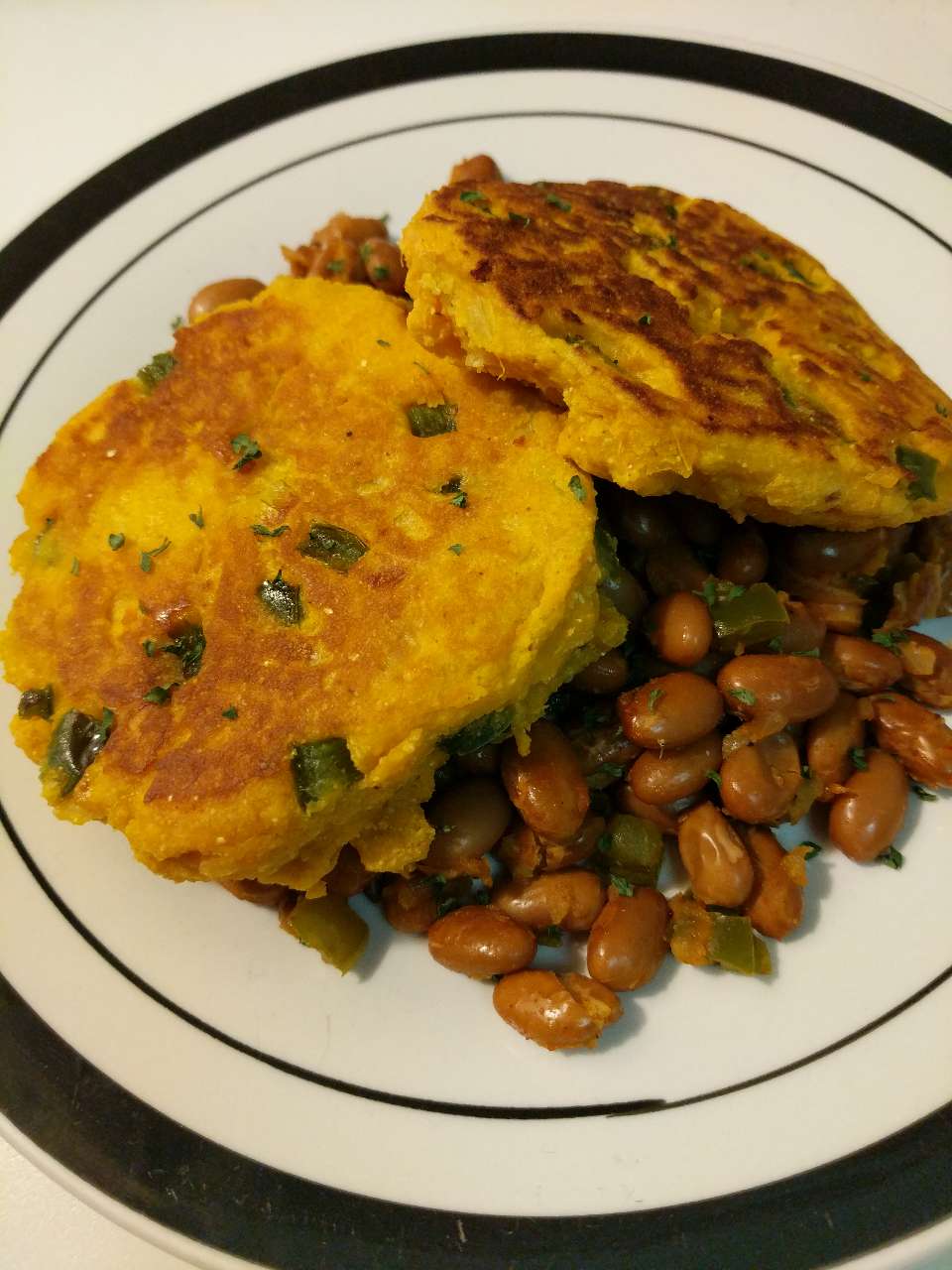 I found this recipe for Sweet potato fritters with smoky pinto beans... OMG!!! this was so yummy