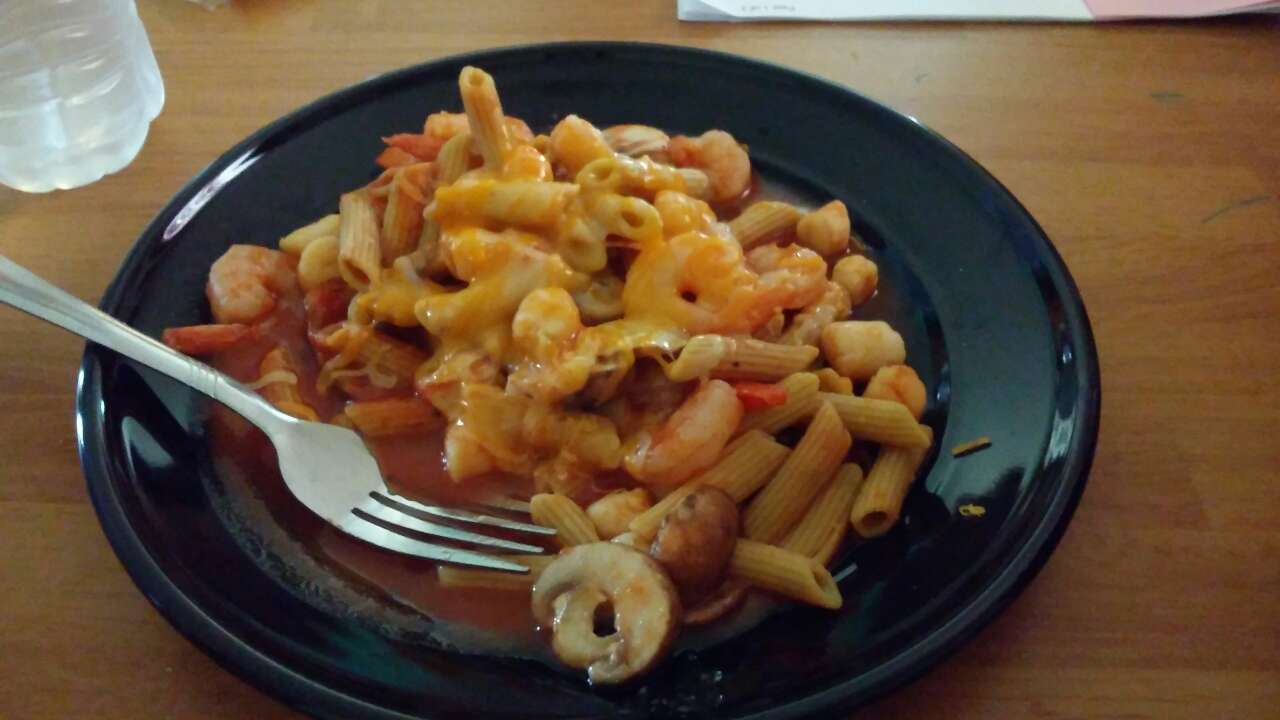 Shrimp, scallops, mushrooms, birds eye lentil and zucchini pasta, light