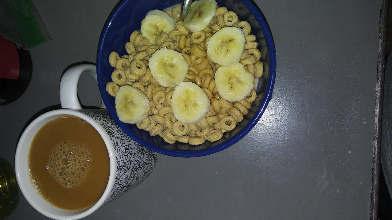 Breakfast before I go out and shovel. Honey nut cheerios with half a