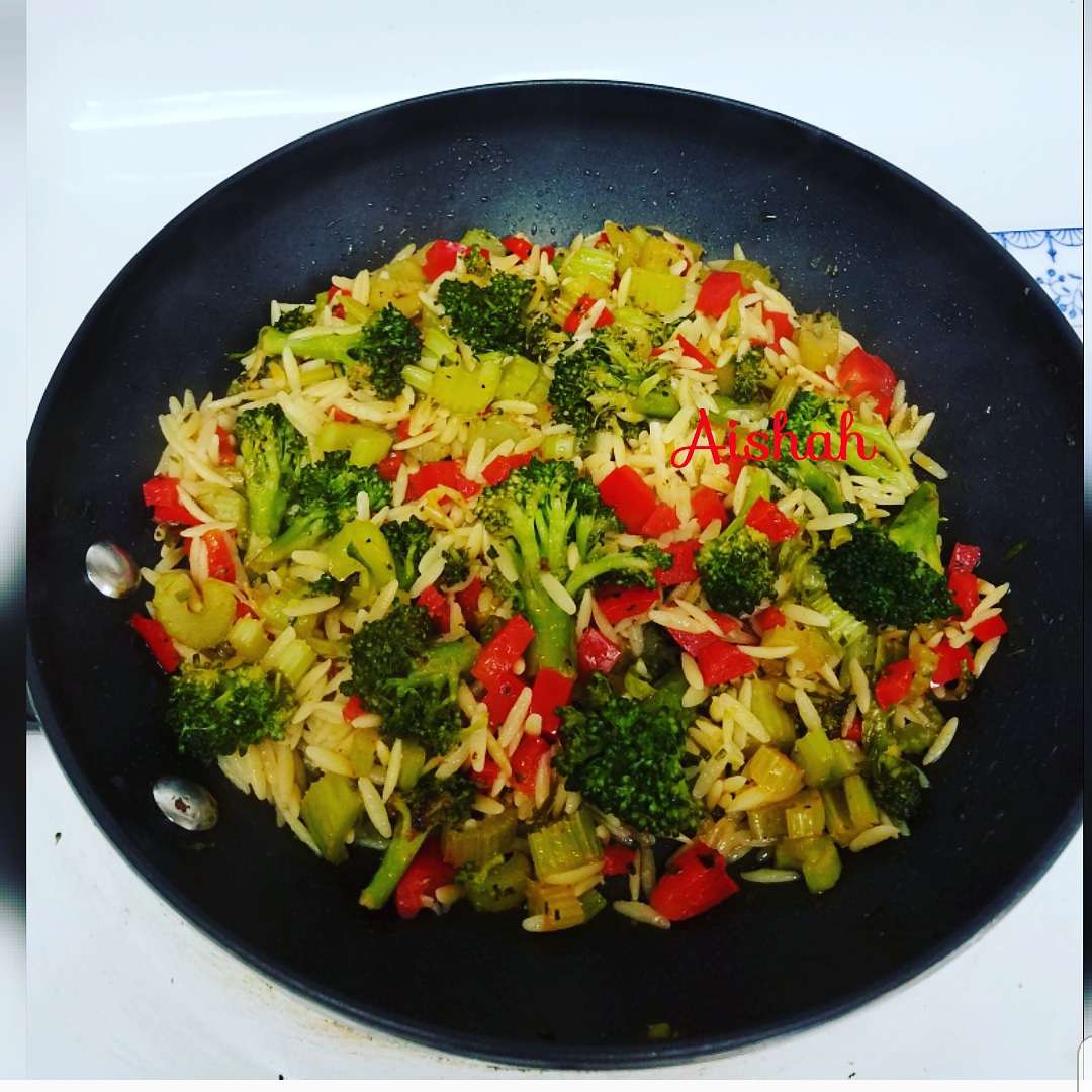 Stir fry veggies with pasta. Broccoli, red pepper, onion, celery, orzo