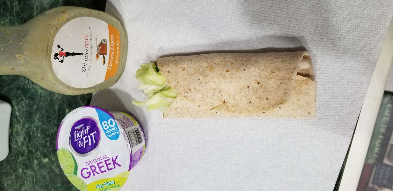 lunch turkey and low calorie swiss cheese, spinach and lettuce wrap