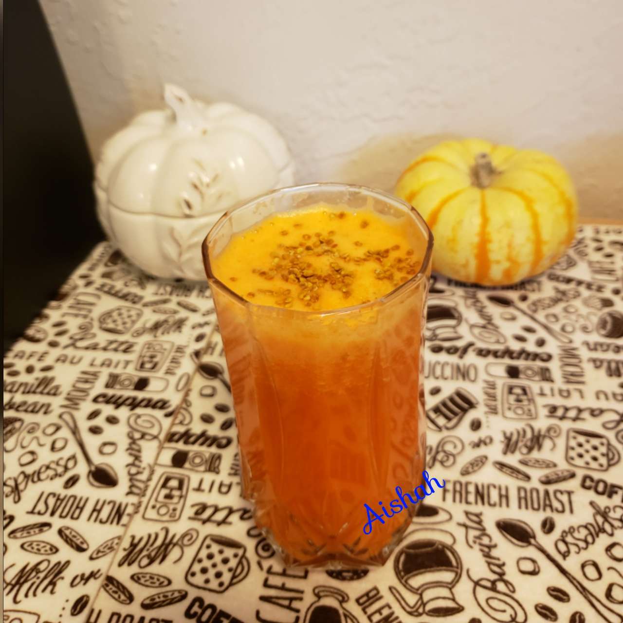 Carrot, turmeric, orange, ginger, lemon juice and water. Tasty smoothie