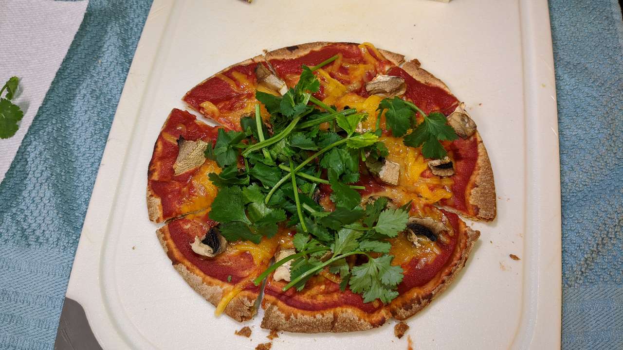 I made a very simple pita bread pizza for dinner tonight tomato sauce
