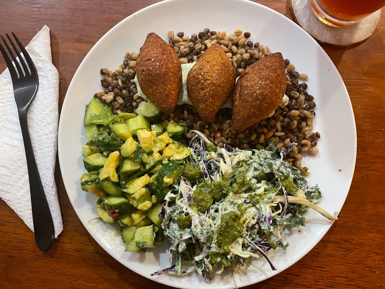 Kibbeh from Trader Joe’s over barley and lentils. The slaw is dressed