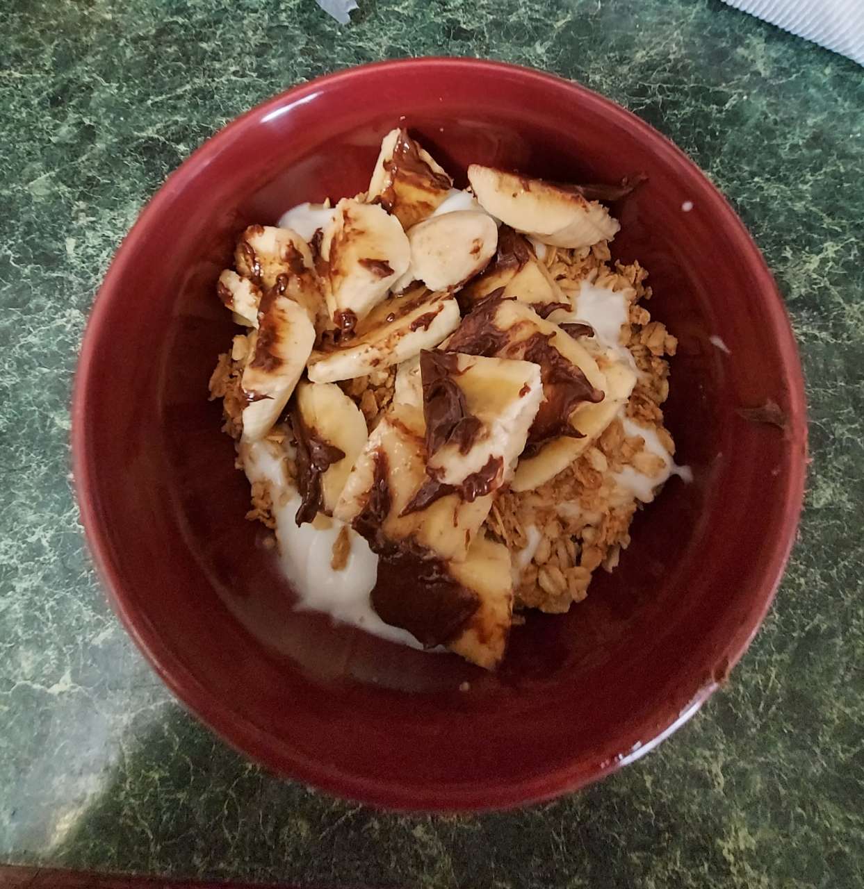 Yummy breakfast! vanilla yogurt, granola, and 1 banana with a bit of