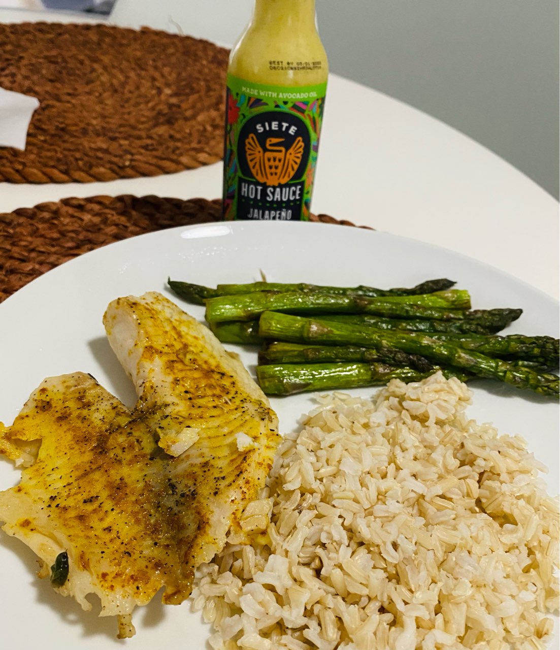 Tilapia, asparagus and brown rice for lunch. I dont eat tilapia often