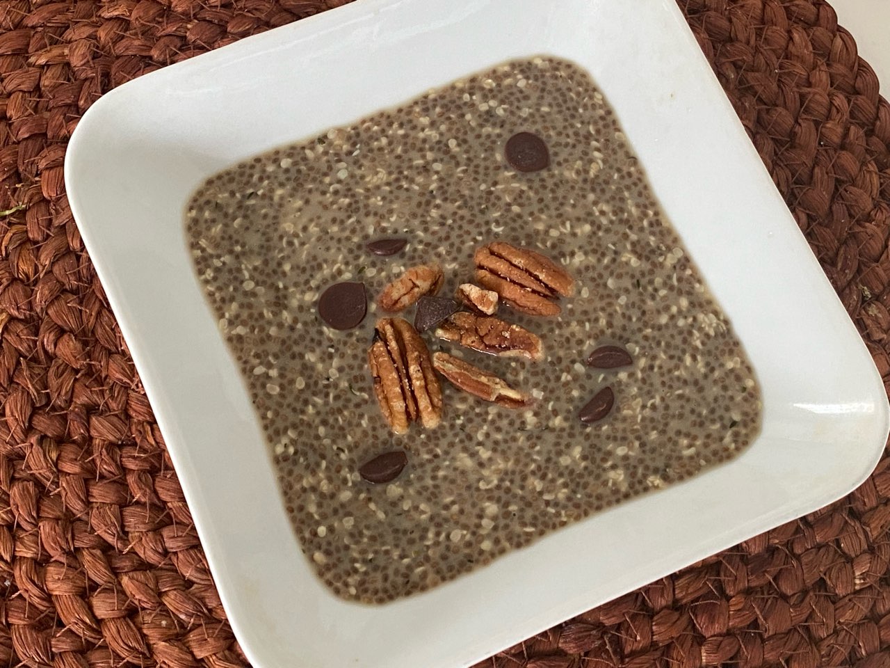 Warm vanilla chia and hemp pudding with oatmilk. Sweetened with maple