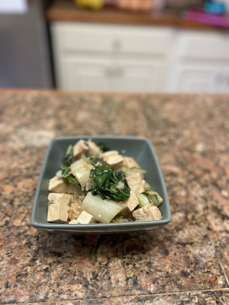 Bok Choi. Brown rice and tofu with homemade plant based peanut sauce. Also sprinkled some sea