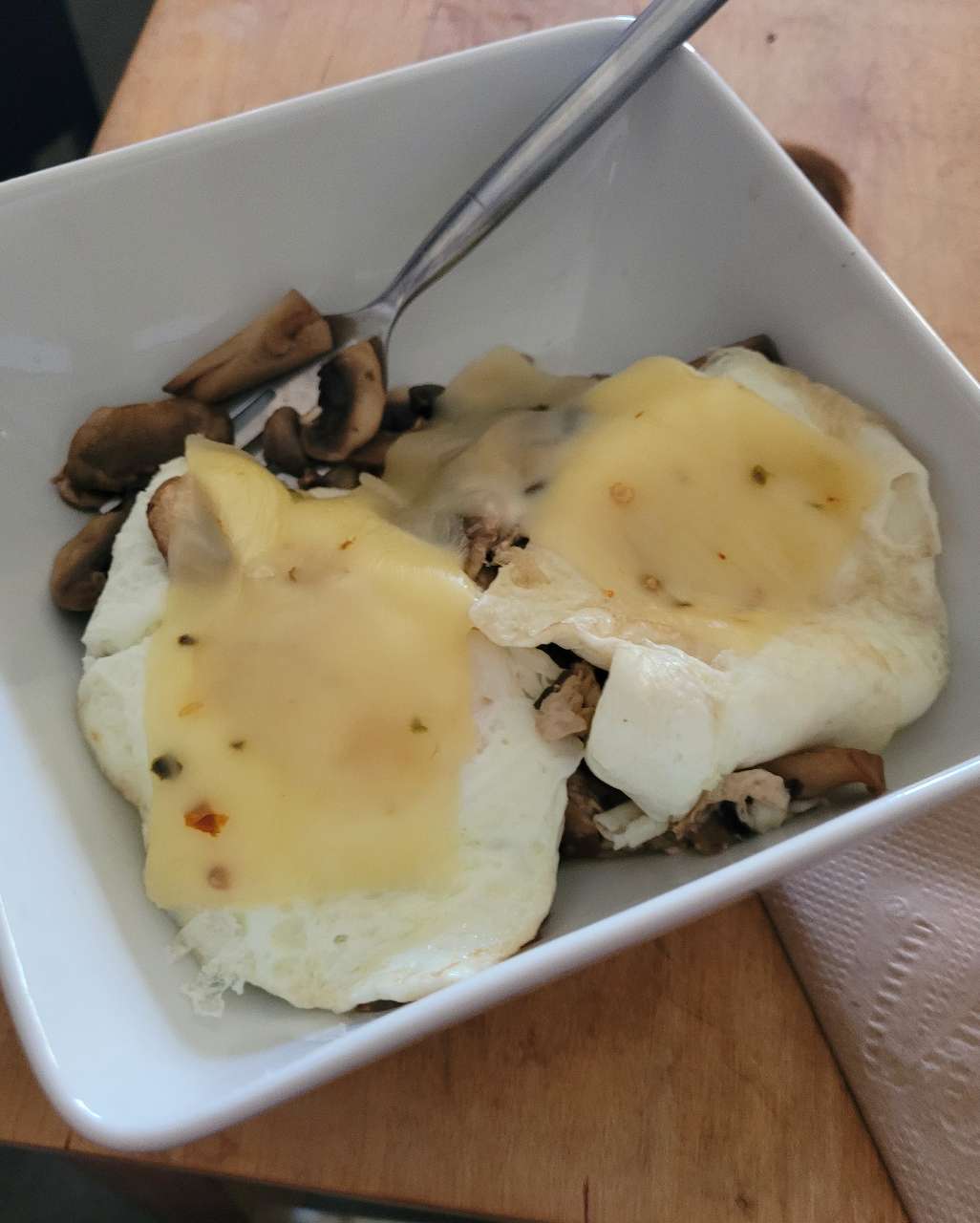 Eggs over easy with reduced fat pepper jack cheese. Mushrooms seasoned