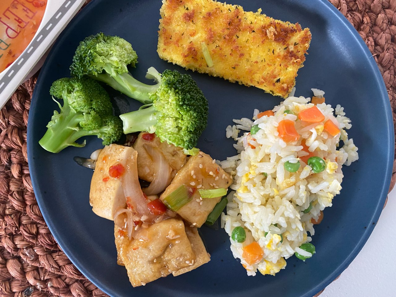 The spread for today. Tofu stir fry with broccoli Pan fried tofu katsu