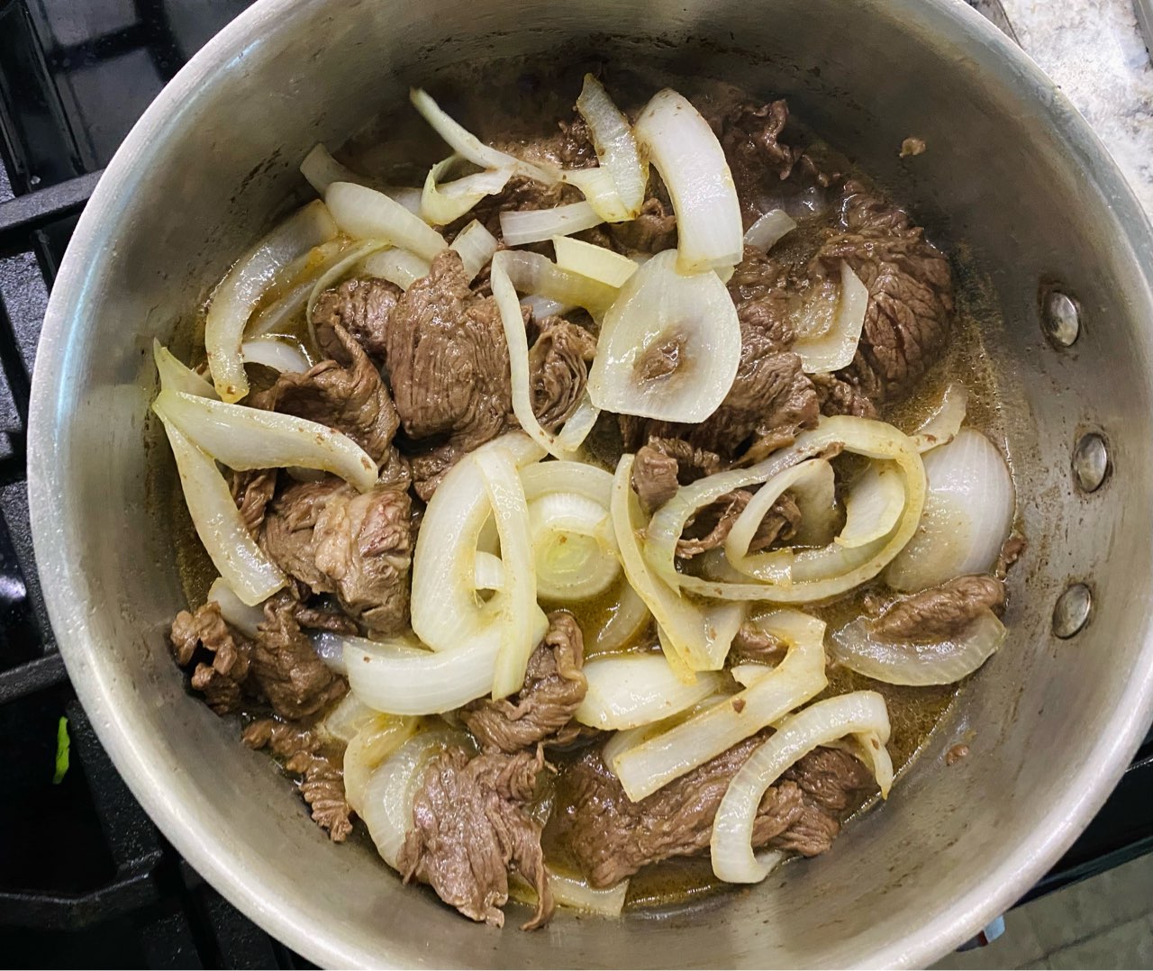 Bistek tagalog (beef w/ onions in soy lemon sauce). I used grass fed