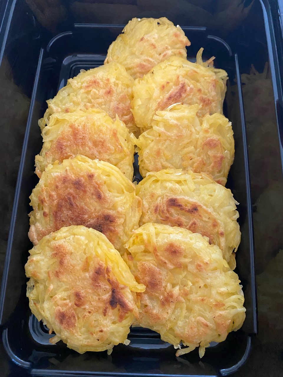 Potato cakes or healthy hash browns. Semi boiled the potatoes. Shredded