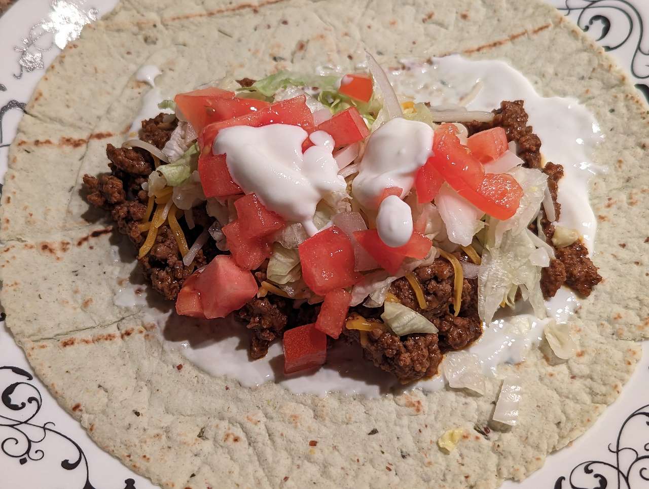 Taco with spinach and herb wrap and yogurt instead of sour cream 😋