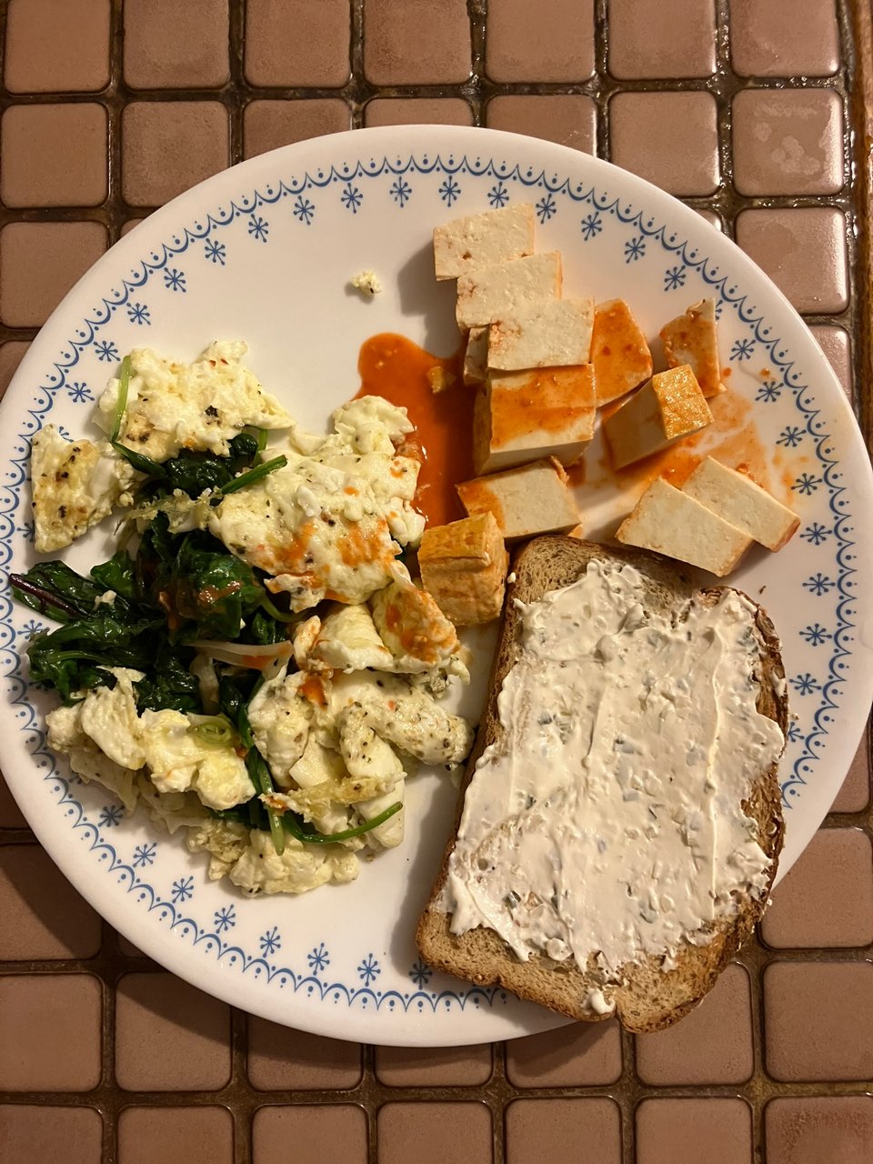 4Egg whites, sriracha tofu,greens, slice of wheat bread w/ TJs onion an
