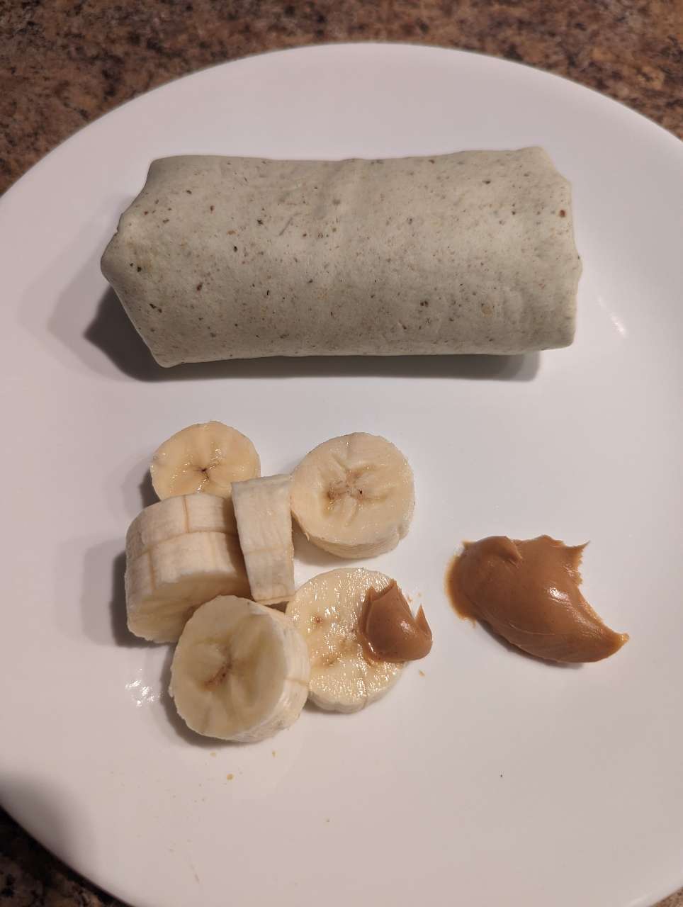 Breakfast burrito with 2 eggs, onion, and nutritional yeast. Half a