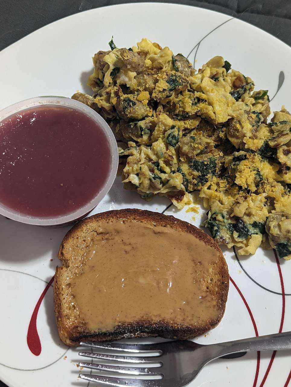 Happy eggs with spinach, onion, and organic chicken sausage
