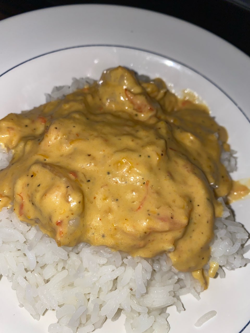 shrimp in creamy coconut sauce over rice Directions, calories